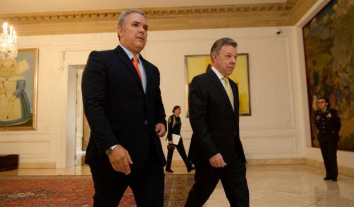 Santos-Duque. Foto: Caracol Radio. Iván Duque y Juan Manuel Santos