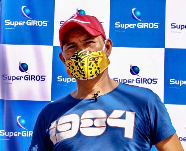 Supergiros entrega subsidios con tapabocas ‘carnavaleros’