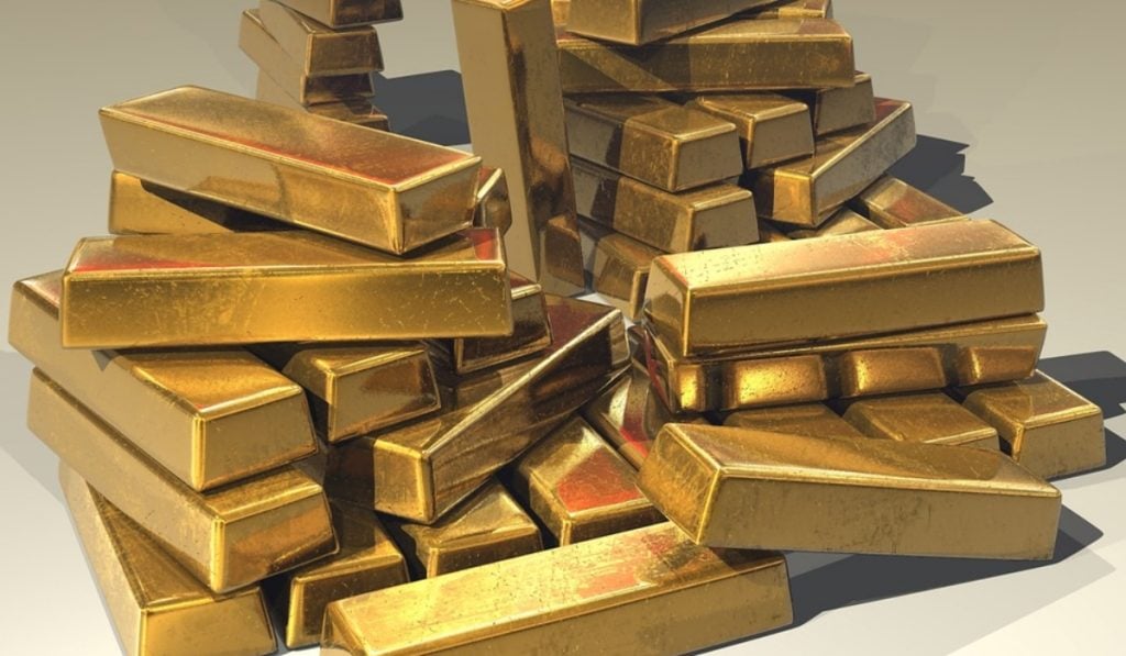 Fortaleza del dólar llevó al oro en su mayor pérdida desde noviembre