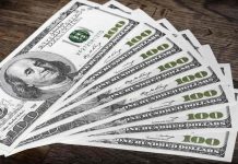 Dólar arranca la jornada a la baja